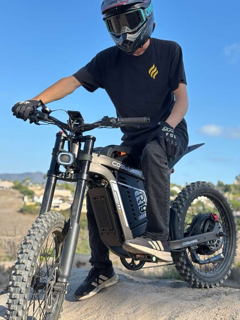 Rider seated on the COSWHEEL R19