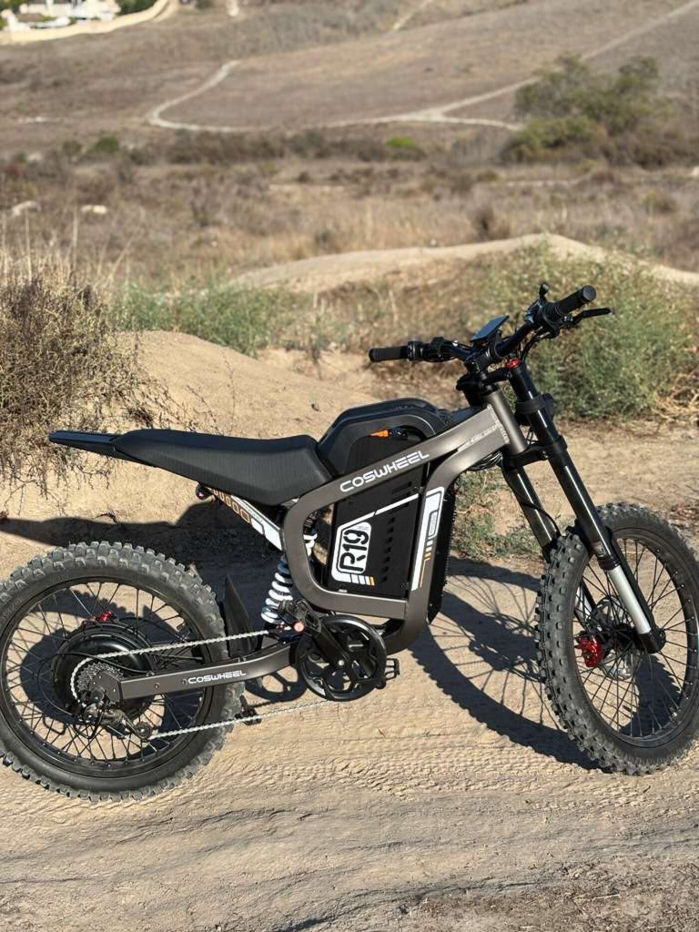 COSWHEEL R19 side profile on a dirt trail